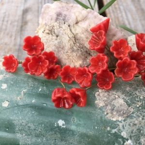 25 Red Glass Flower Charms with Brass Wire.